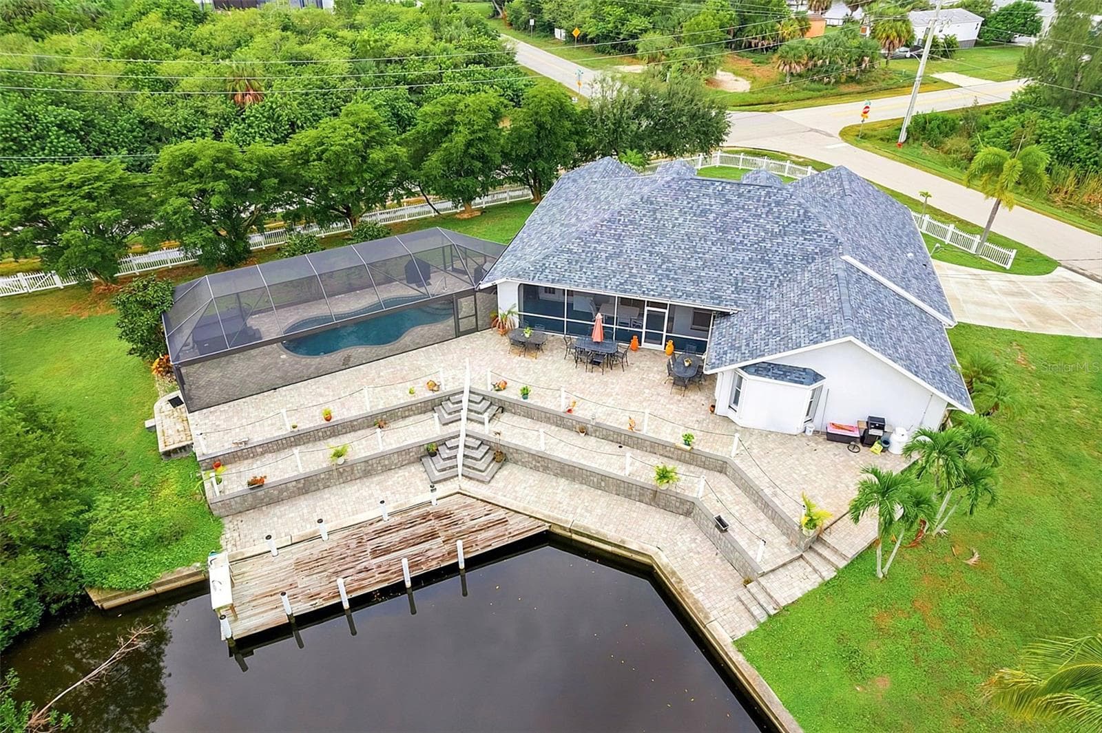 Aerial View of Home and Dock - 614 RIO VILLA DR, PUNTA GORDA