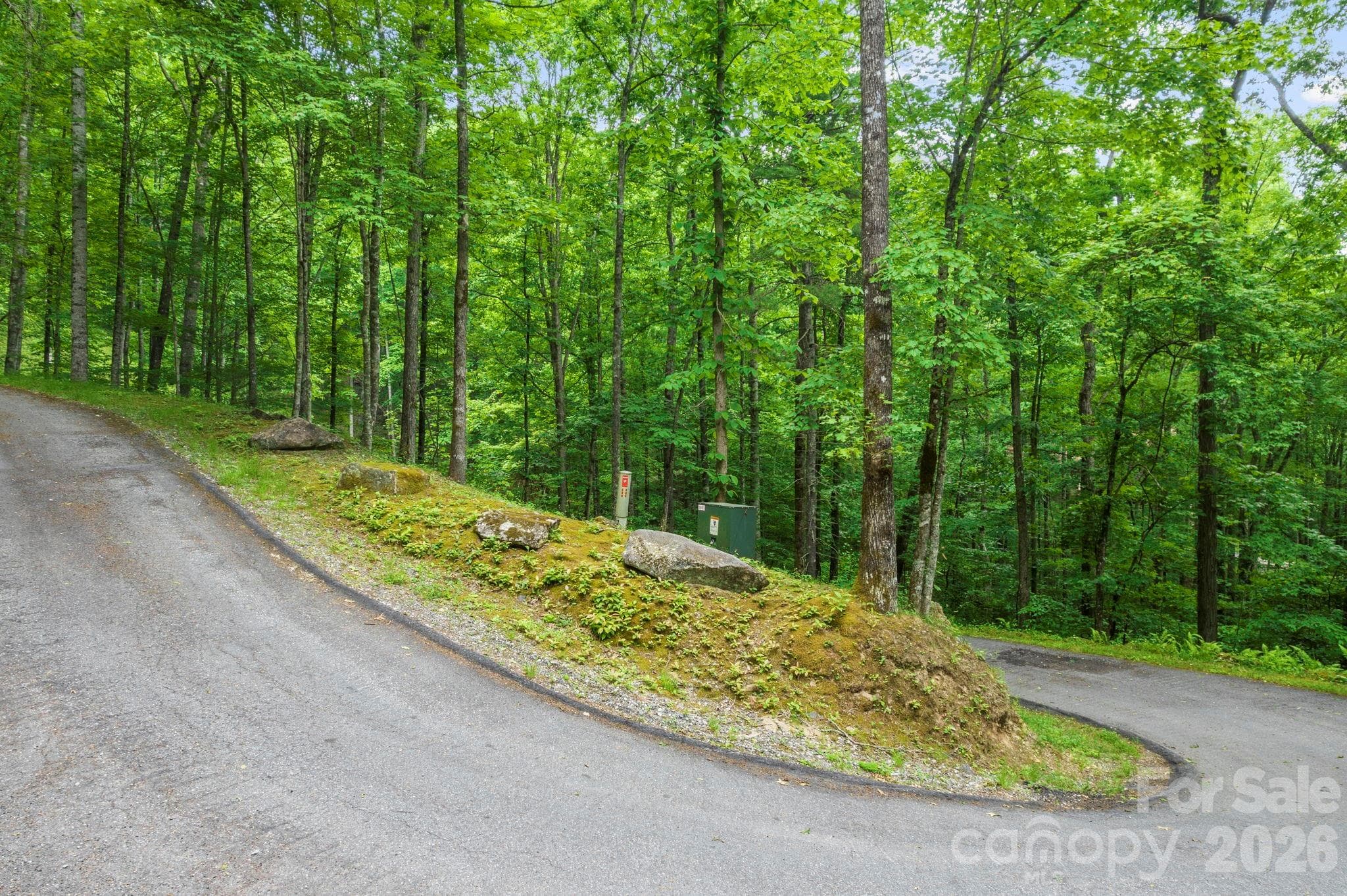 The lot has road access on the top and bottom. - Lt 10 Von Trapp Lane, Tuckasegee