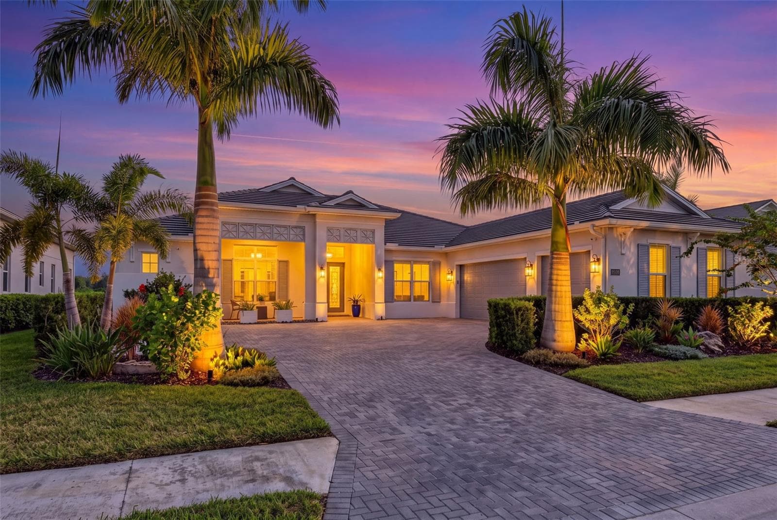 Twilight Front Exterior - 8448 CANE BAY CT, LAKEWOOD RANCH