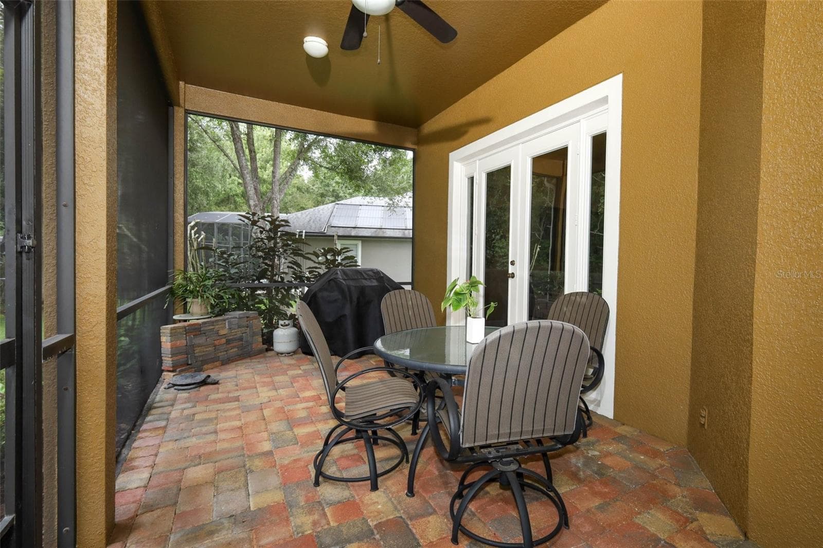 Screened lenai with paver brick all the way to the Gazebo - 475 VERANDAH CT, WINTER SPRINGS