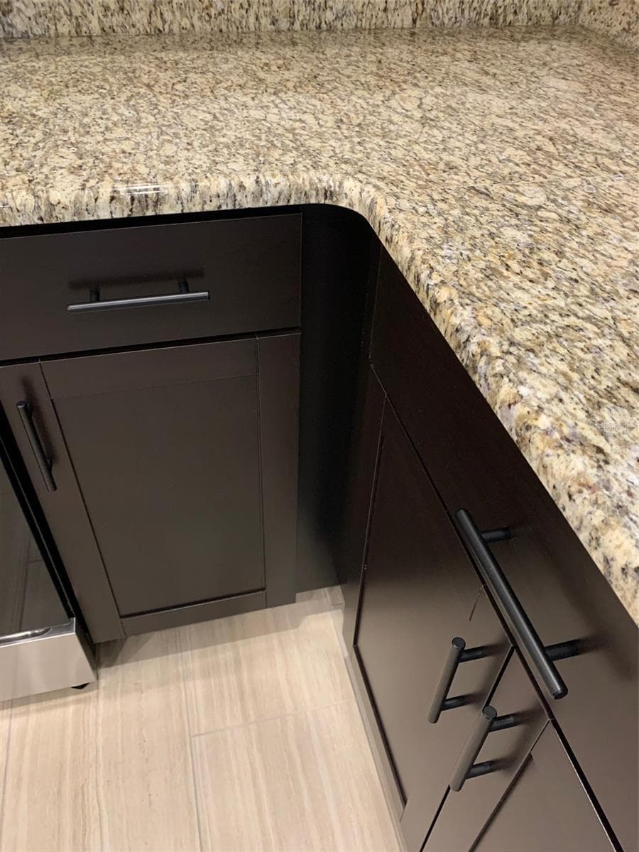 cabinets-countertops-tile flooring - 11619 GRACE RD, WEEKI WACHEE
