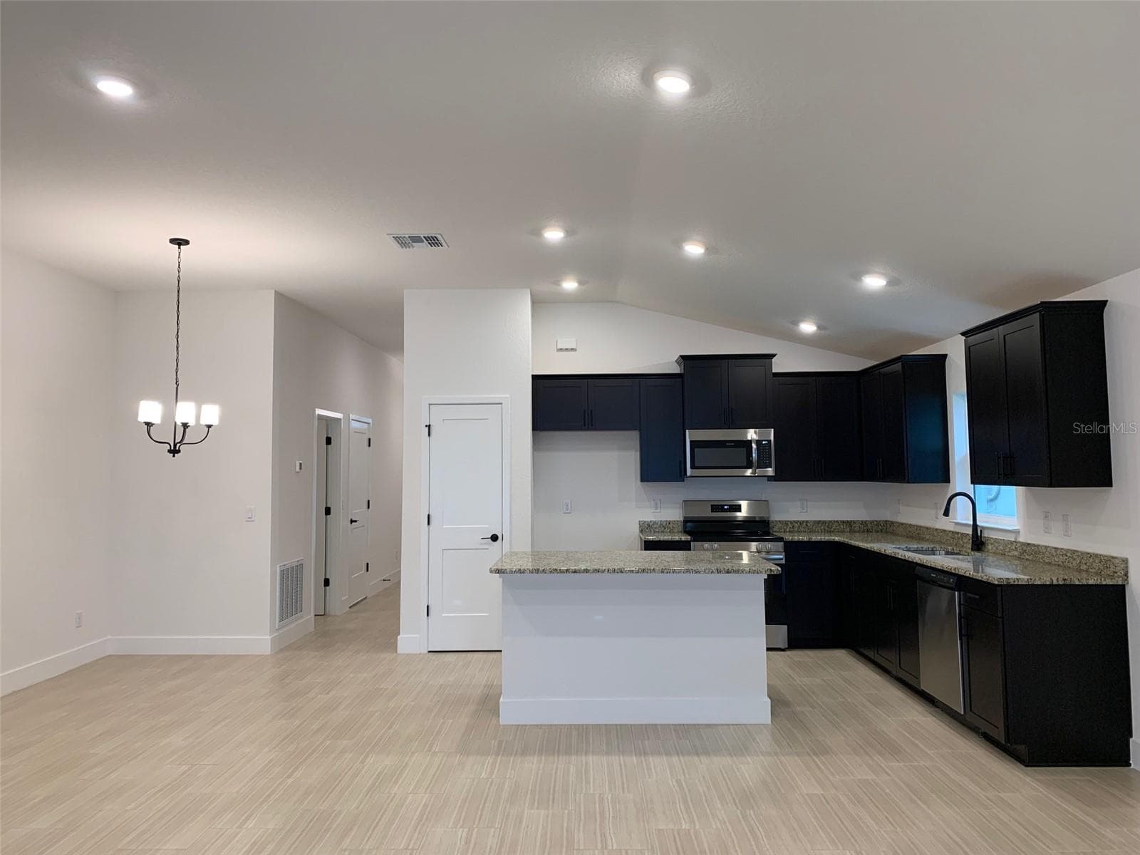 kitchen/dining area - 11619 GRACE RD, WEEKI WACHEE