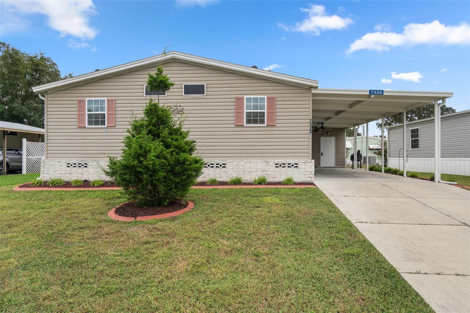 Manufactured Home at 7526 FAIRLANE AVE, BROOKSVILLE, photo 2 of 52