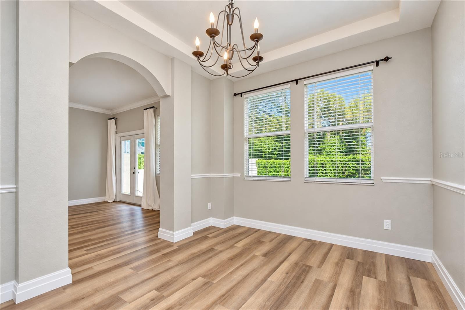 Separate dining room provides a dedicated space for family meals and entertaining. - 828 LUMSDEN RESERVE DR, BRANDON