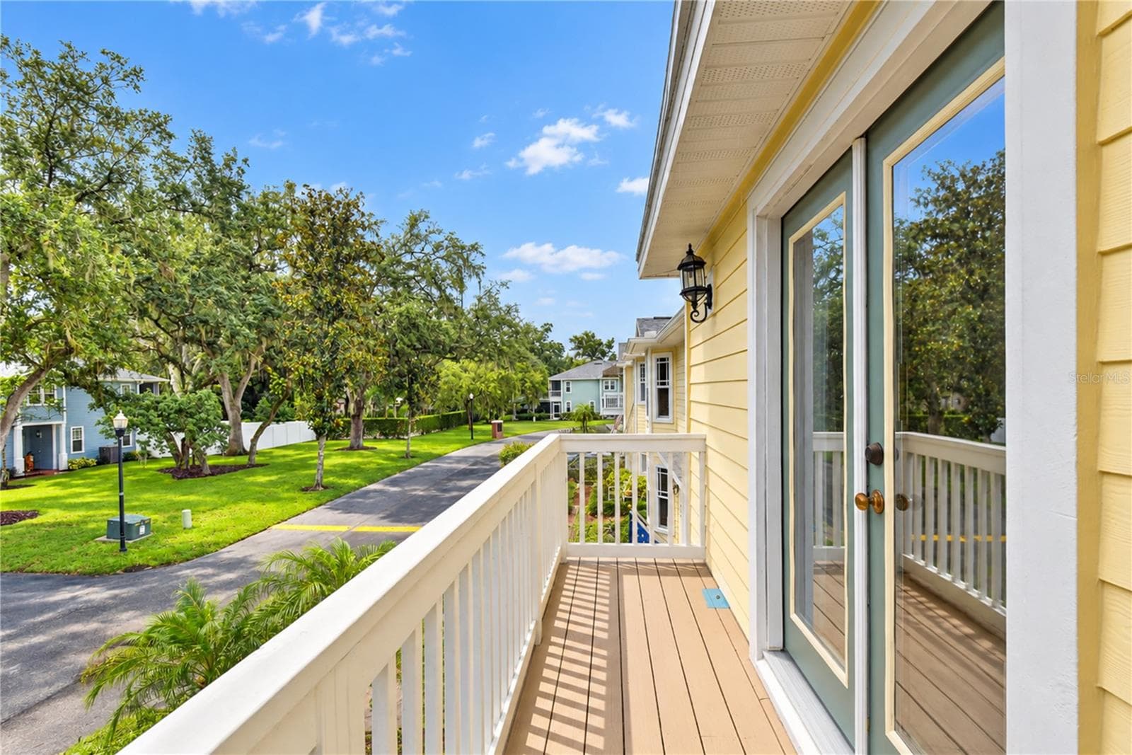 Outdoor balcony provides a peaceful spot to enjoy fresh air and unwind. - 828 LUMSDEN RESERVE DR, BRANDON