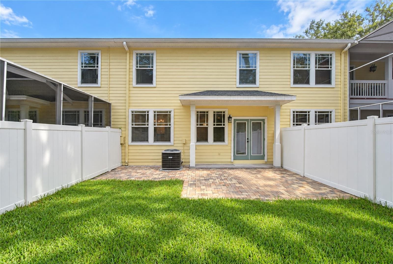 Outdoor patio extends the living space and provides a private area to unwind. - 828 LUMSDEN RESERVE DR, BRANDON