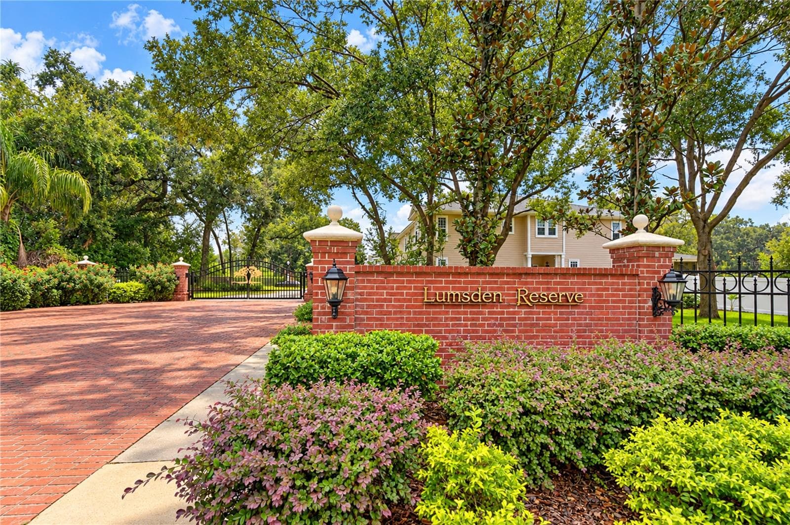 Secure gated entrance provides a welcoming arrival into Lumsden Reserve. - 828 LUMSDEN RESERVE DR, BRANDON