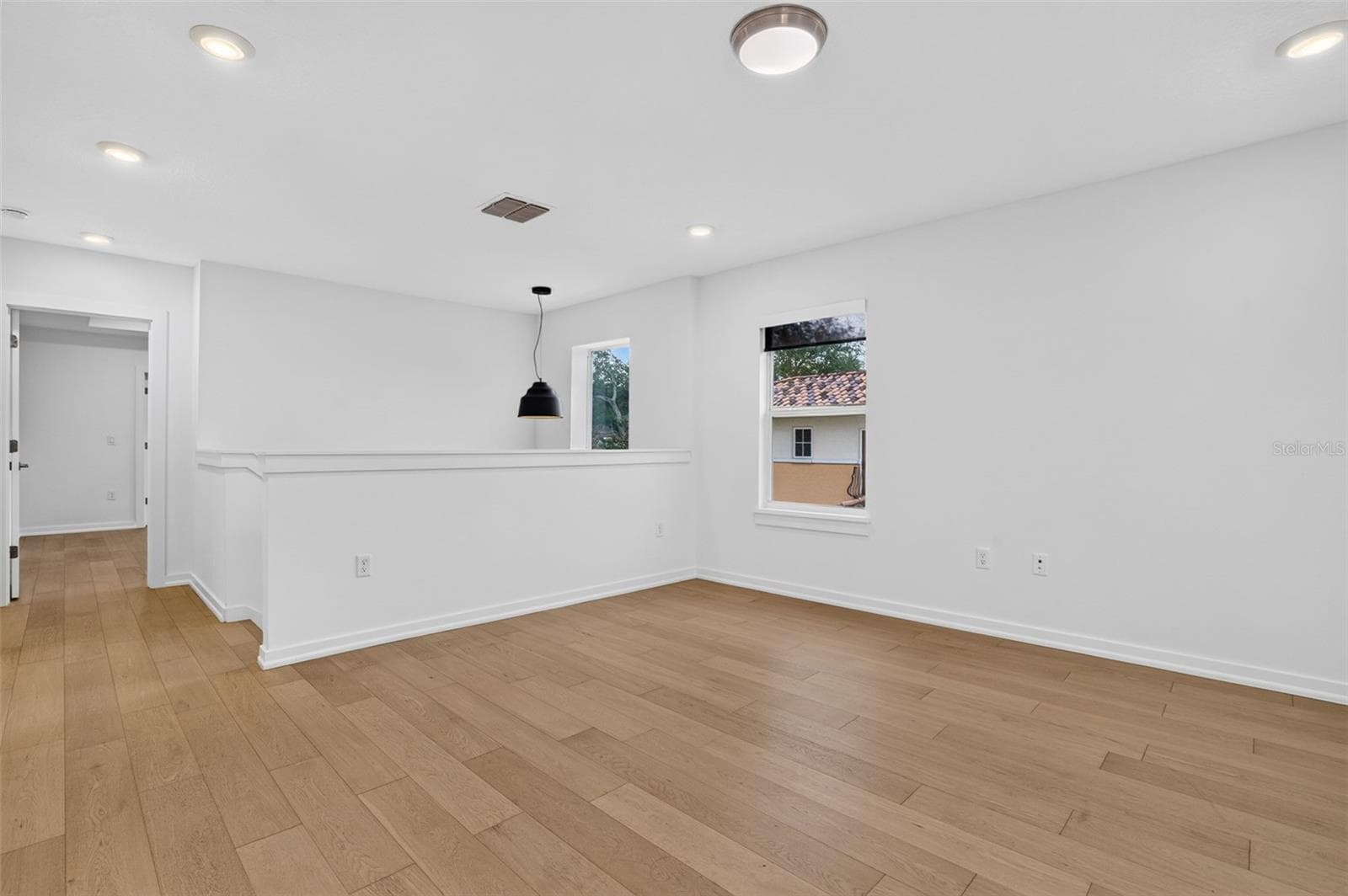 Stairwell and Hall that lead to Master Suite. - 5818 1/2 S 6TH ST, TAMPA