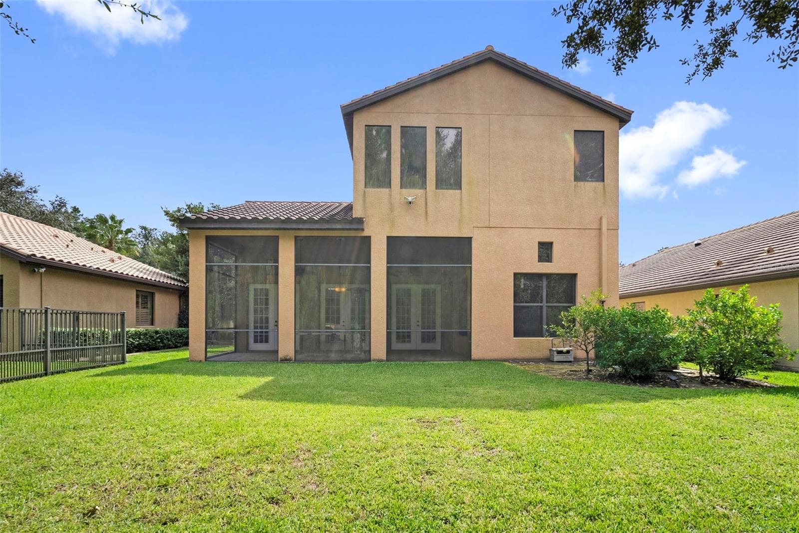 Exterior Rear- Screened/Covered Patio - 8264 DUNHAM STATION DR, TAMPA