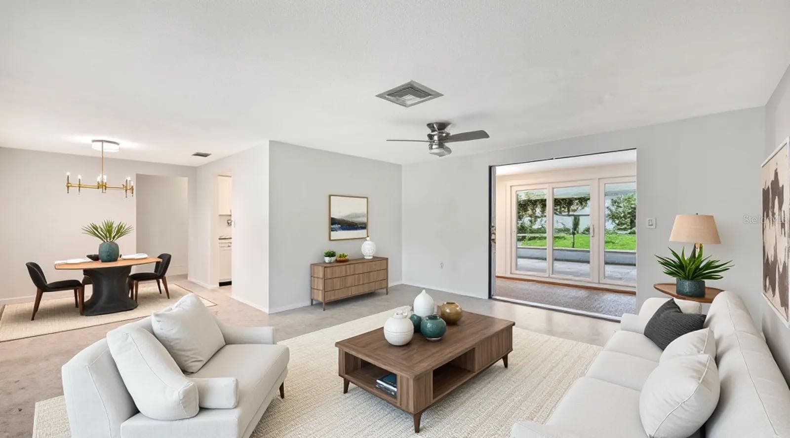 Staged Living and Dining Rooms - 2610 REGATTA DR, SARASOTA