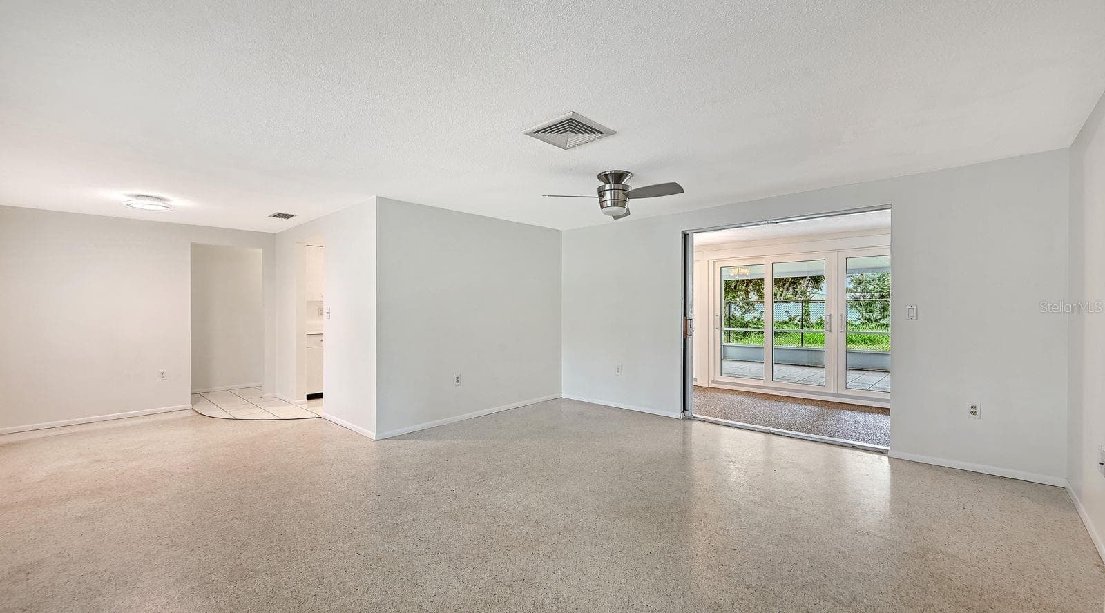 Unstaged Living and Dining Rooms - 2610 REGATTA DR, SARASOTA
