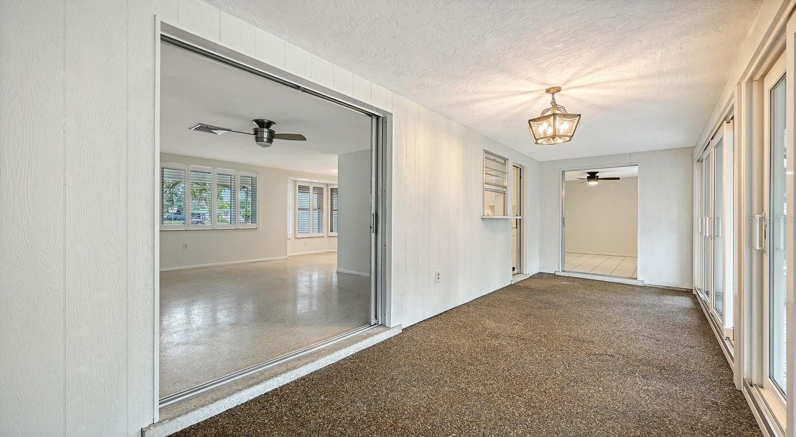 Florida Room, Living Room & Guest Bedroom - 2610 REGATTA DR, SARASOTA