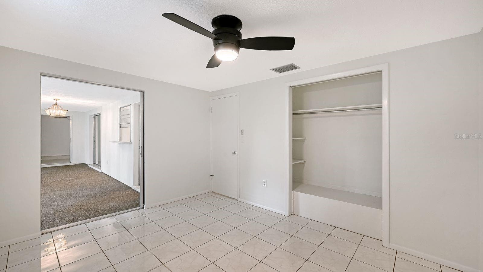 Guest Bedroom with a Slider to the Florida Room - 2610 REGATTA DR, SARASOTA