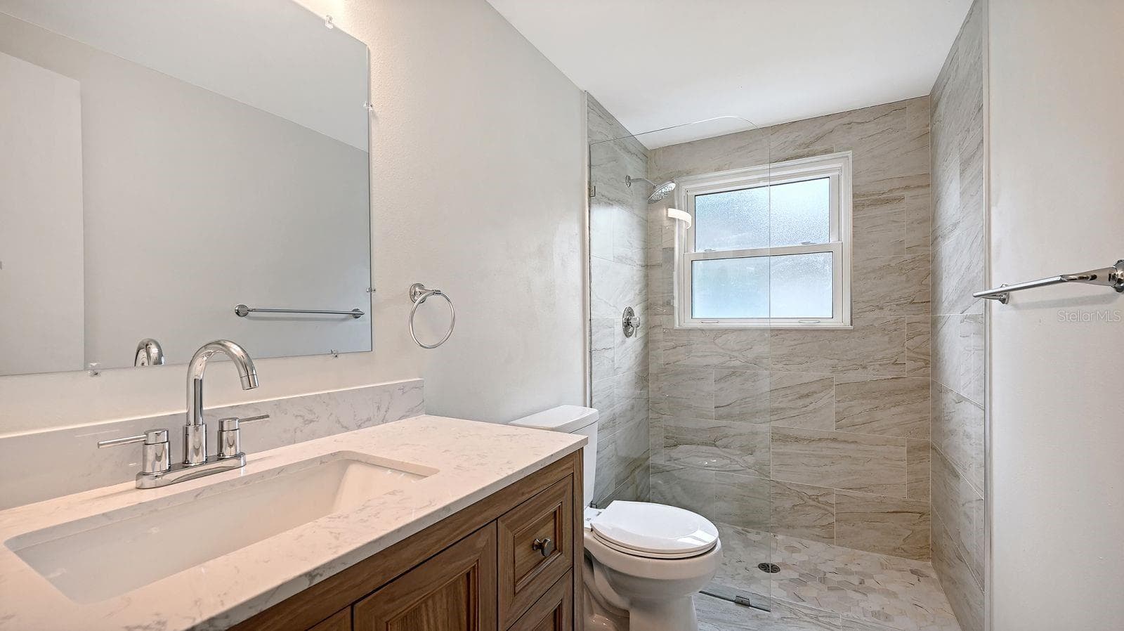 Unstaged Guest Bathroom completely remodeled - 2610 REGATTA DR, SARASOTA