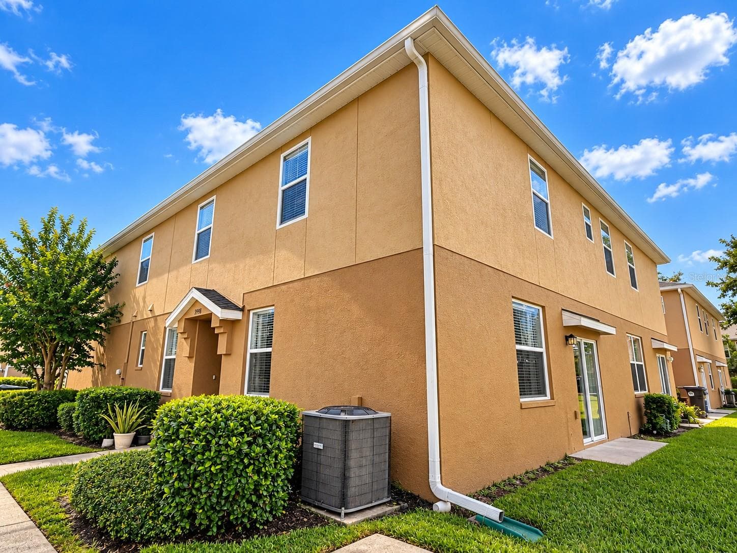 Townhome with side exposure - 3998 PEMBERLY PINES CIR, ST CLOUD