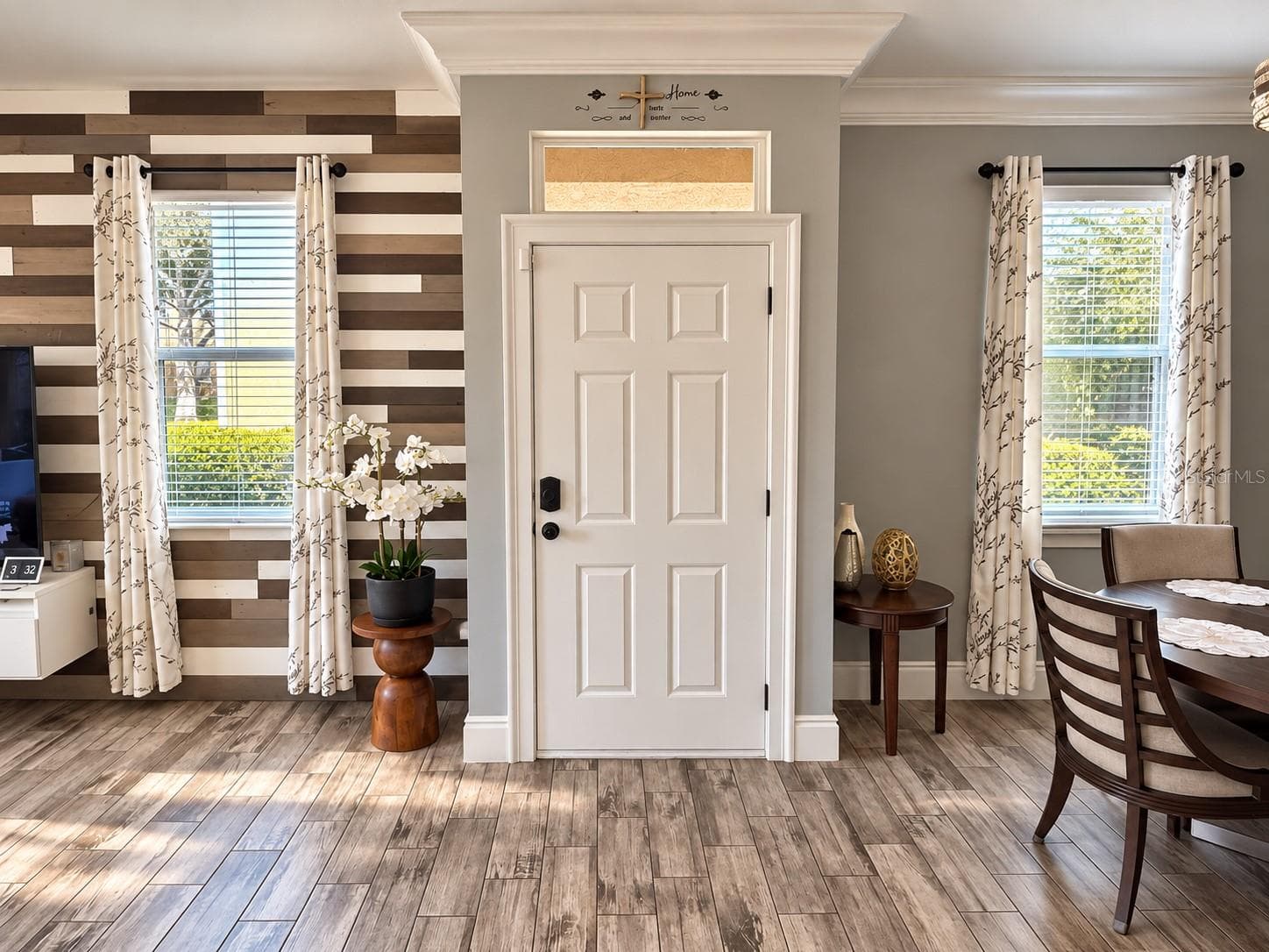 Welcoming entryway with stylish wood-look flooring. - 3998 PEMBERLY PINES CIR, ST CLOUD