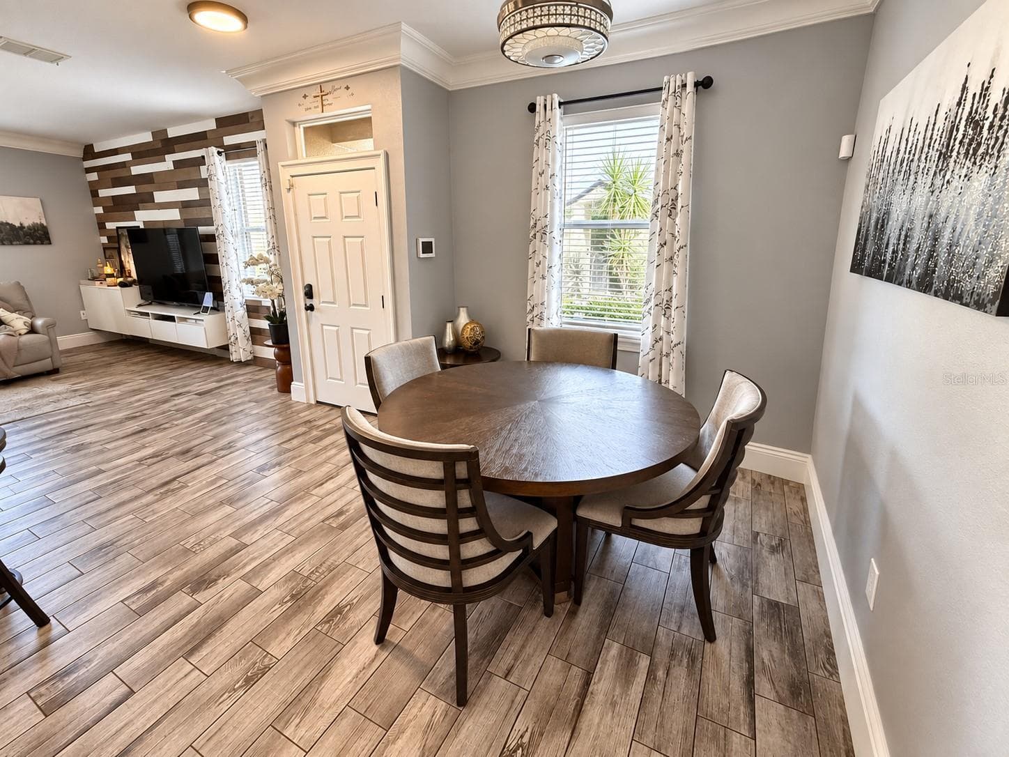 Dining area with elegant finishes. - 3998 PEMBERLY PINES CIR, ST CLOUD