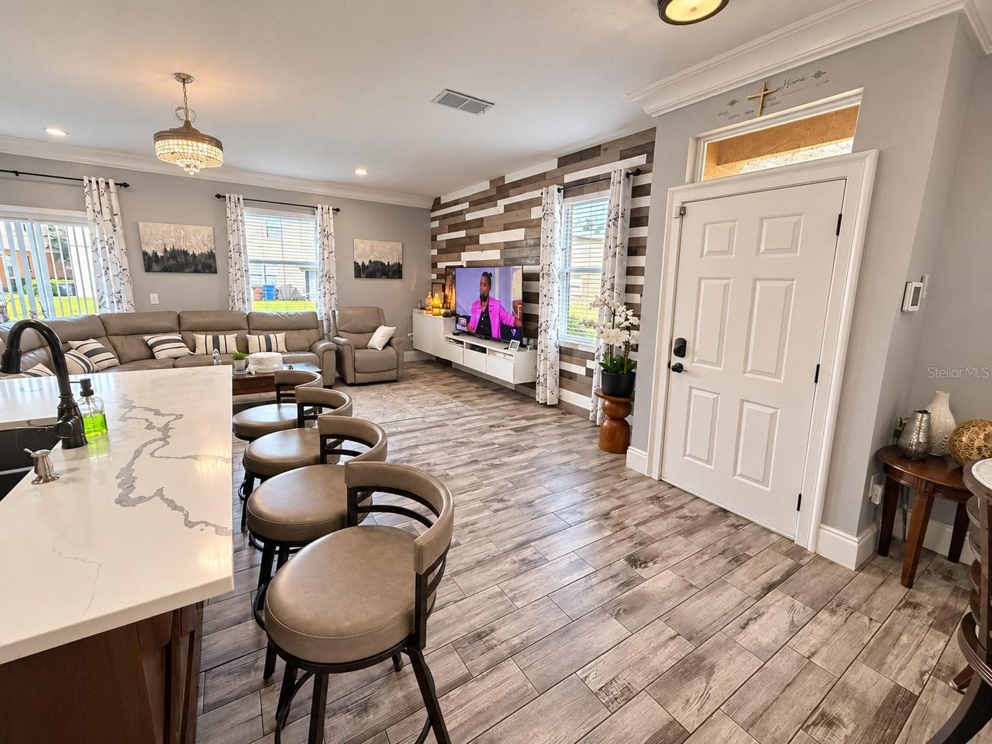 Open-concept living and dining space - 3998 PEMBERLY PINES CIR, ST CLOUD