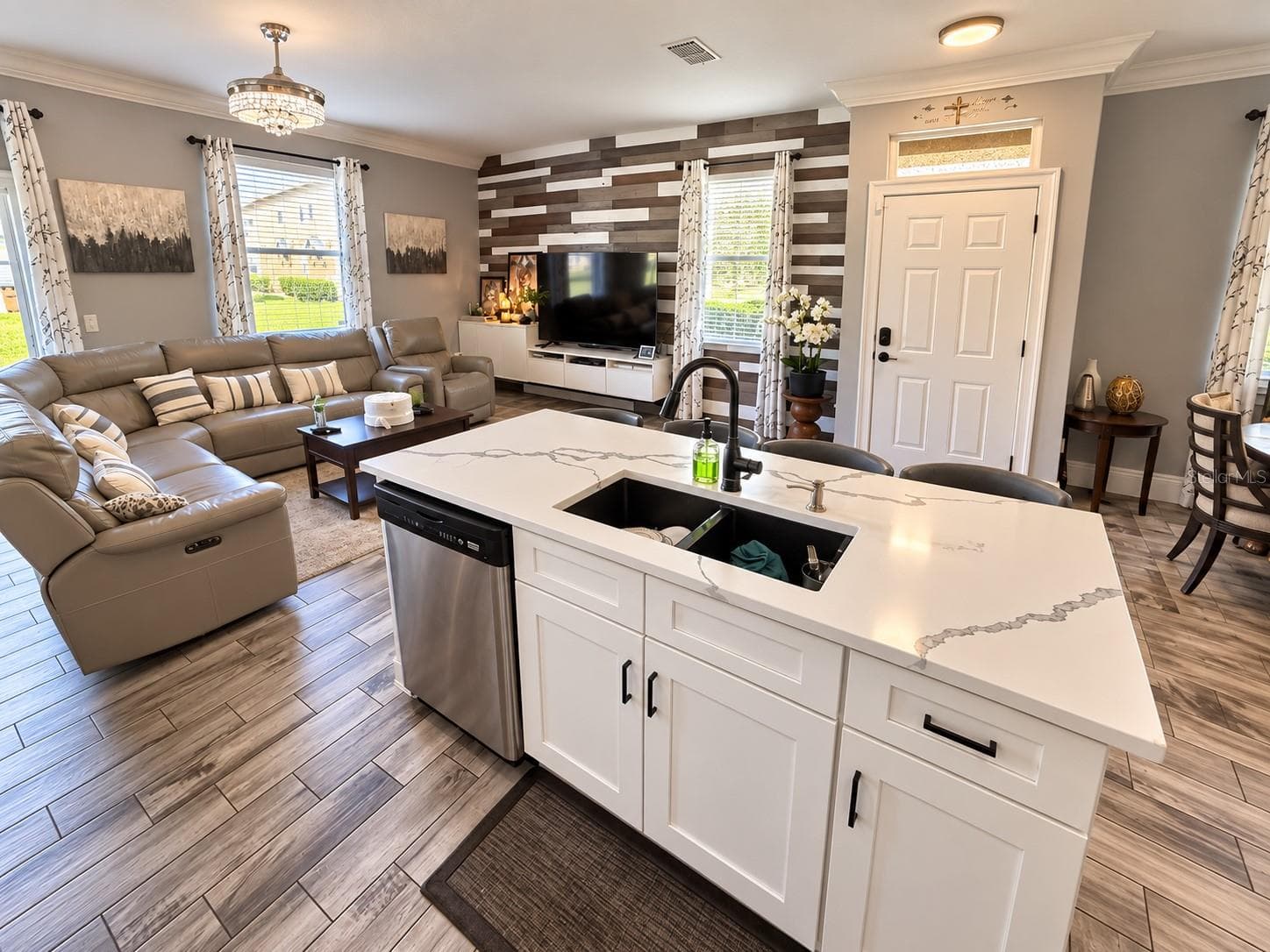 Kitchen island overlooking the living area. - 3998 PEMBERLY PINES CIR, ST CLOUD