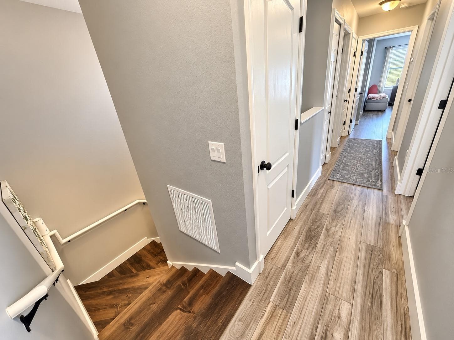 Stairway and upstairs hallway. - 3998 PEMBERLY PINES CIR, ST CLOUD