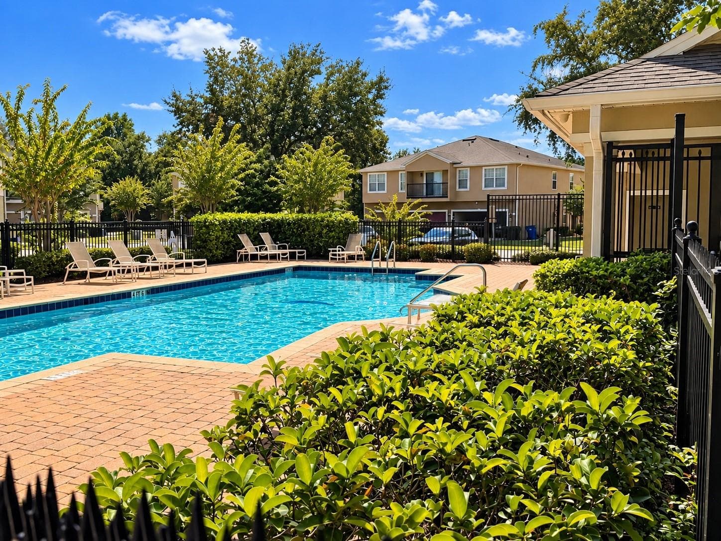 Another view of the community pool and surrounding amenities. - 3998 PEMBERLY PINES CIR, ST CLOUD