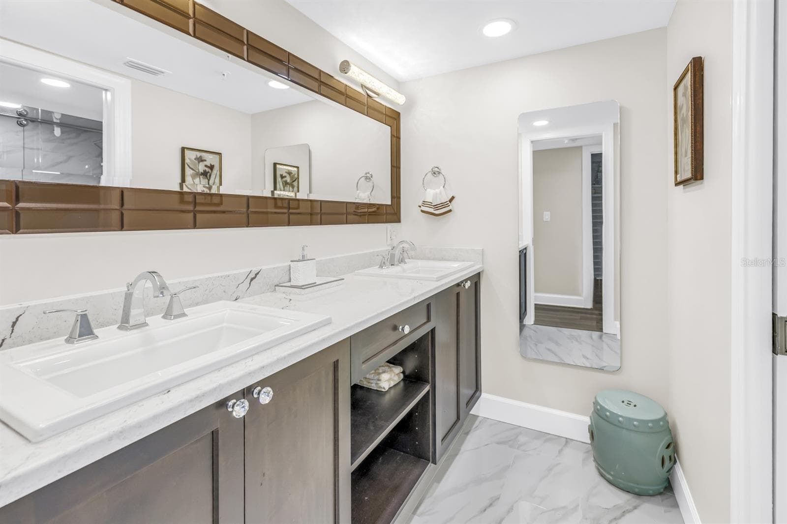 Primary En-Suite Features Quartz and Glass Enclosed Shower - 15462 GULF BLVD #1006, MADEIRA BEACH