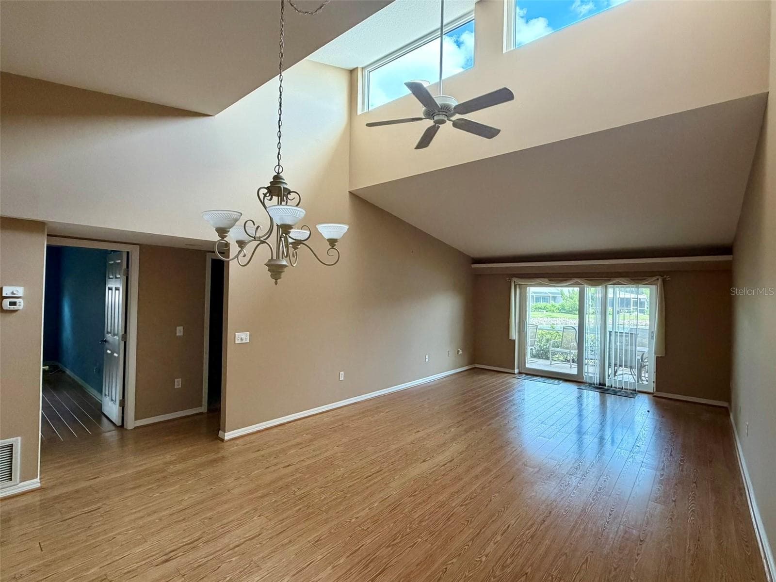 Dramatic cathedral vaulted ceilings in LR - 4621 HIDDEN VIEW PL #27, SARASOTA