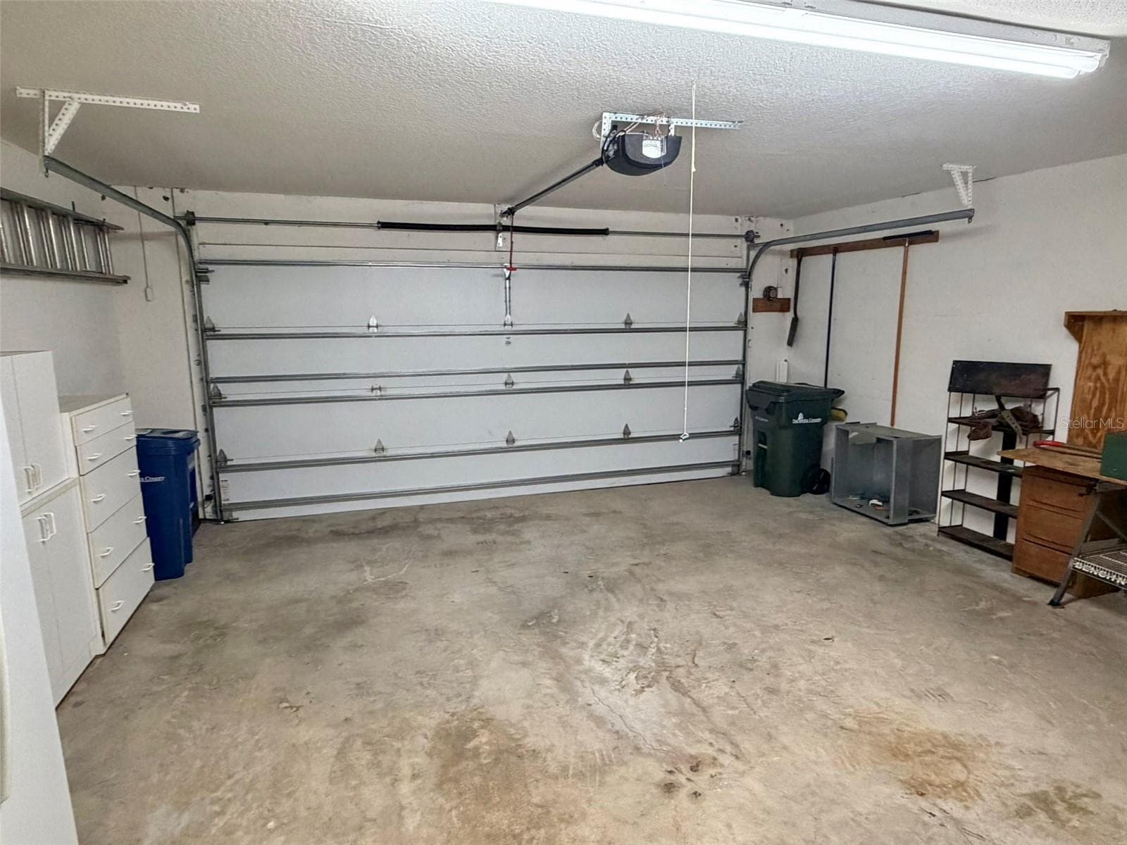 Two car garage - 4621 HIDDEN VIEW PL #27, SARASOTA