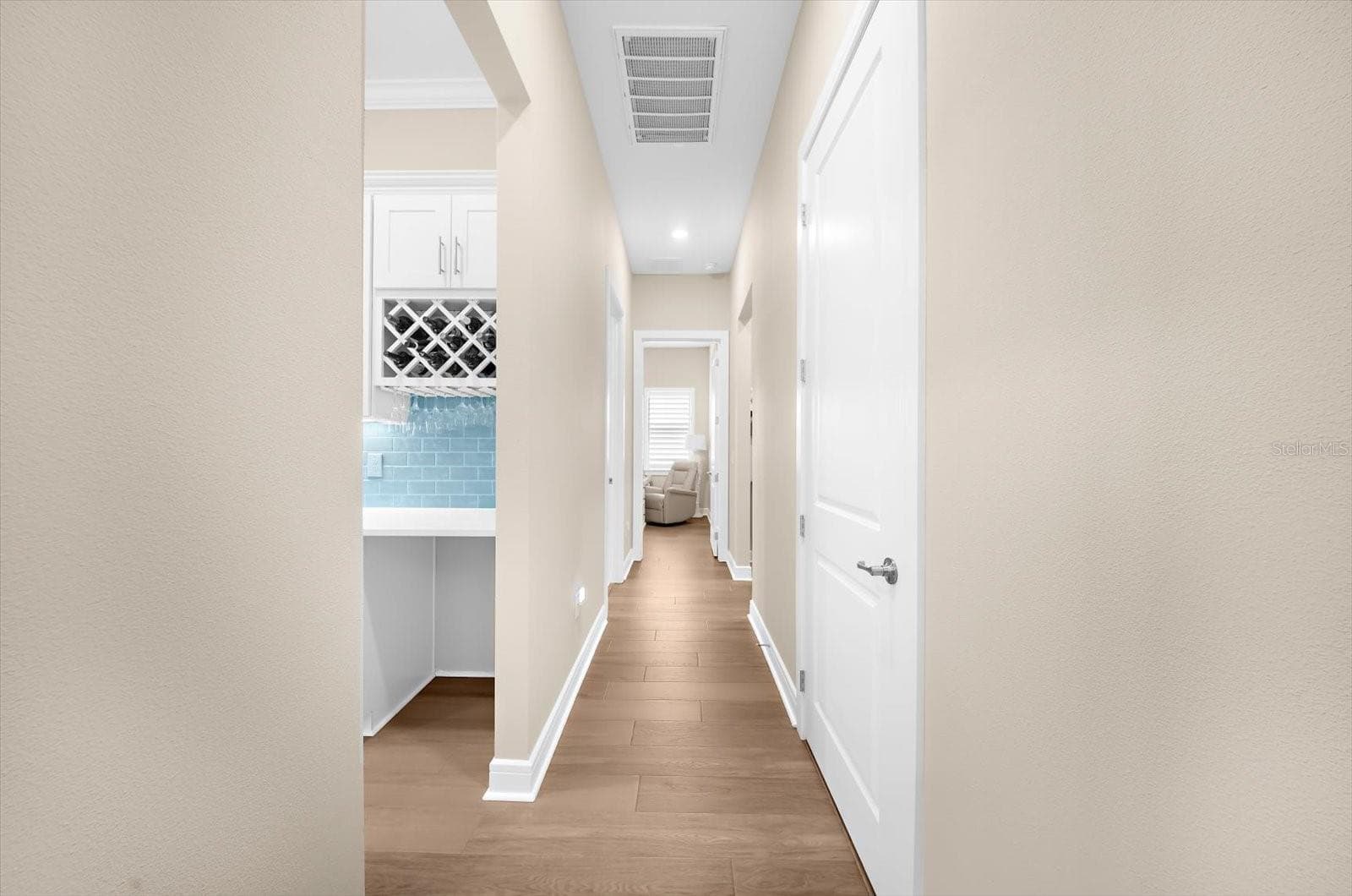 Hall going to garage, laundry room and the third bedroom - 10716 SARATOGA PL, PARRISH