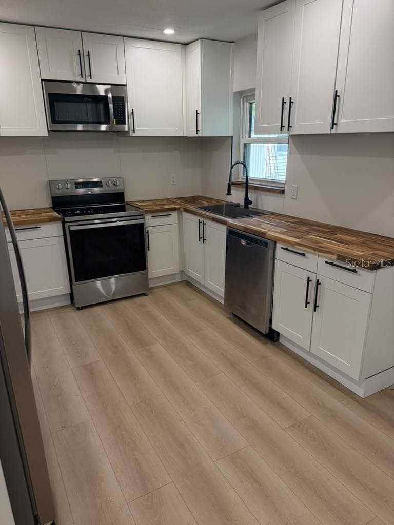 Single Family Residence at 209 PLAZA OVAL, CASSELBERRY, photo 8 of 21