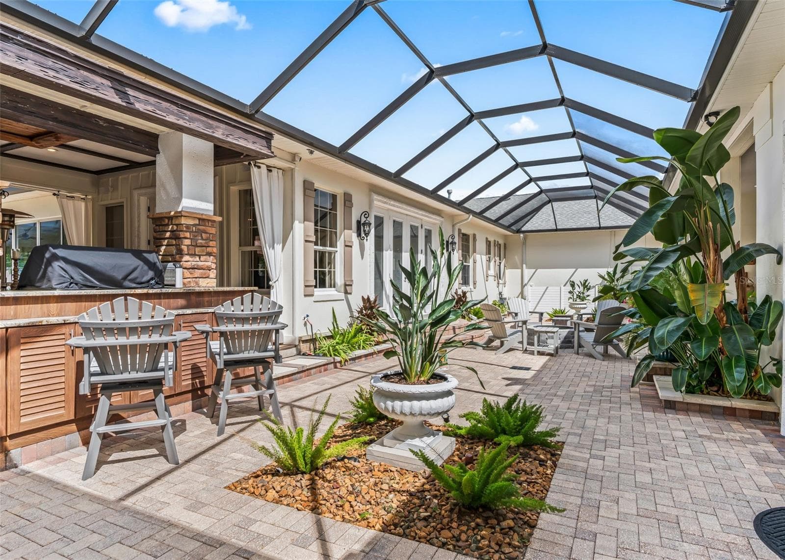 Courtyard with Lush Lanscaping and Stone Footing - 2917 LARRANAGA DR, THE VILLAGES