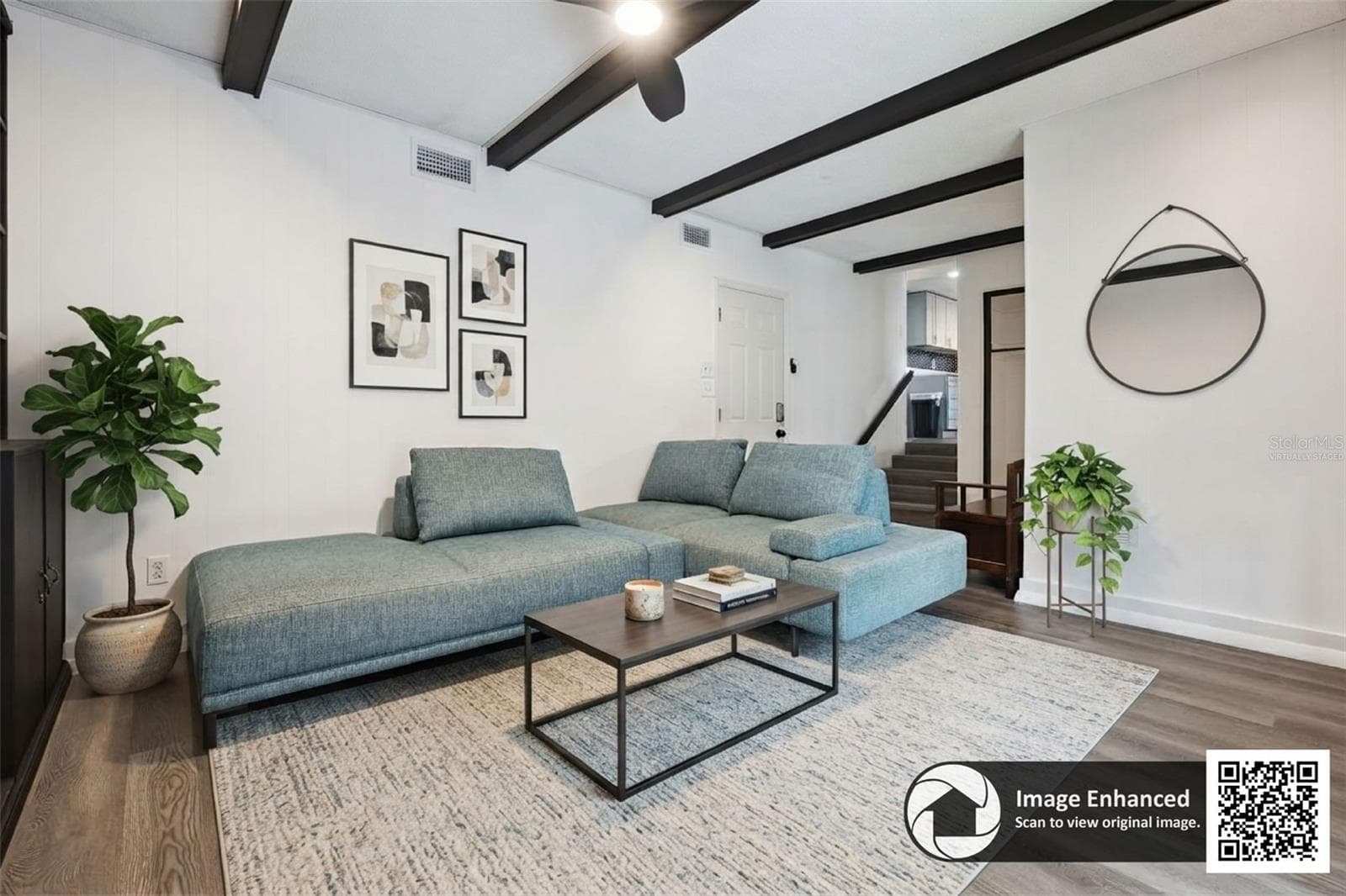family room virtually staged - 2228 KING CHARLES CT, WINTER PARK