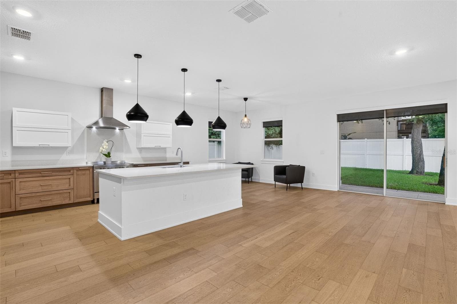 Open Floor Plan Sliders to back yard and covered porch area. - 5818 1/2 S 6TH ST, TAMPA