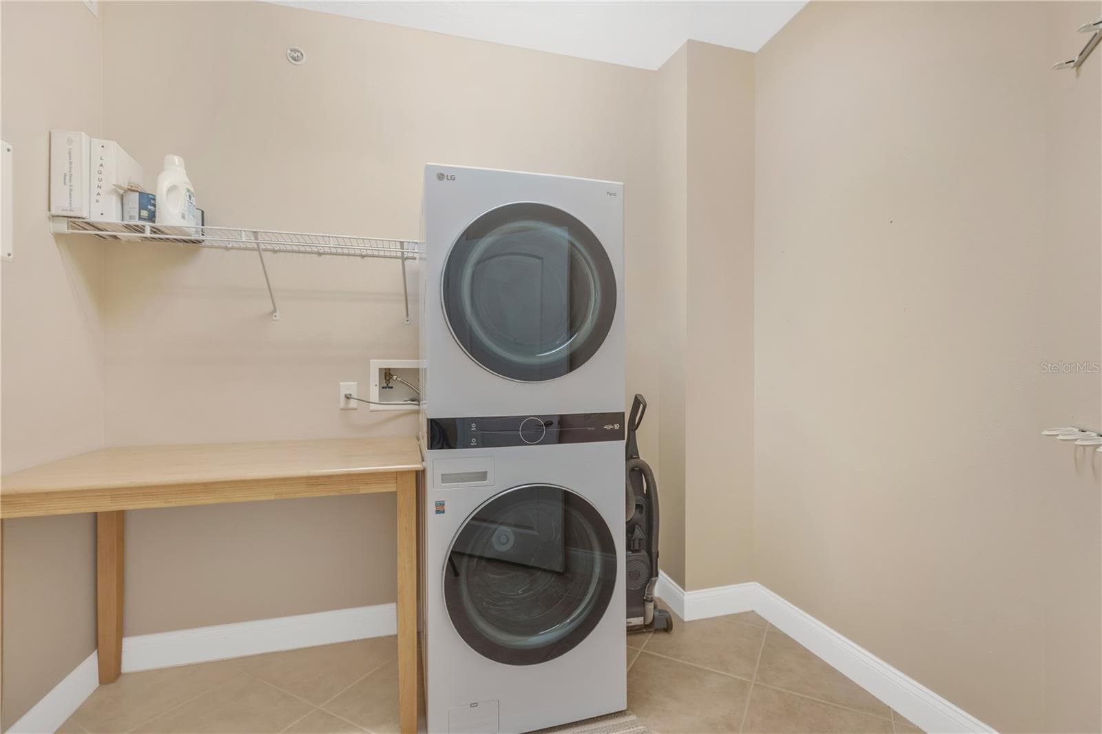 Laundry Room with New (2025) Washer and Dryer Tower. - 606 RIVIERA DUNES WAY #405, PALMETTO
