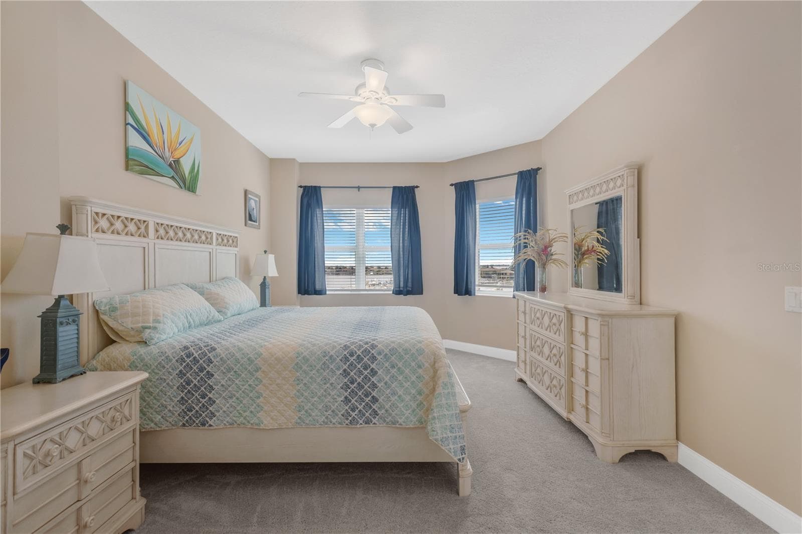 Loads of Natural Light fill the Primary Bedroom - 606 RIVIERA DUNES WAY #405, PALMETTO