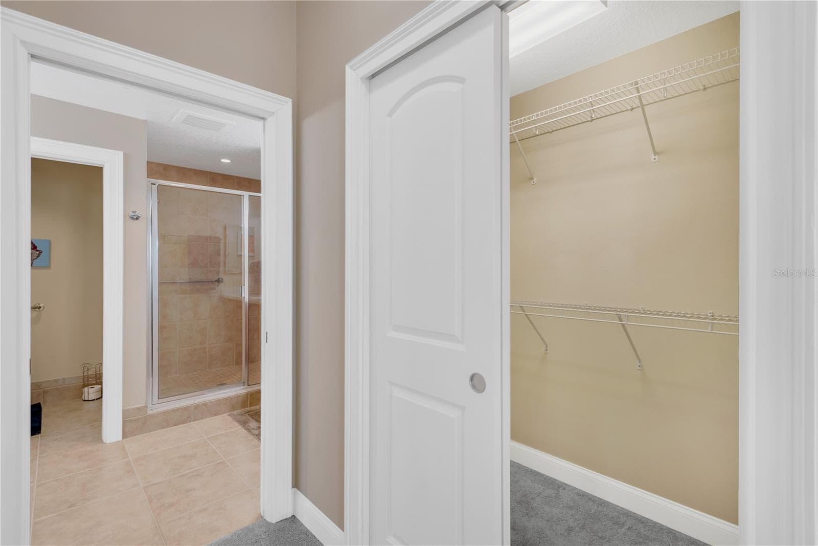 2 Closets - one Built-in and one Walk-in in the hallway leading to the En-suite Bath - 606 RIVIERA DUNES WAY #405, PALMETTO
