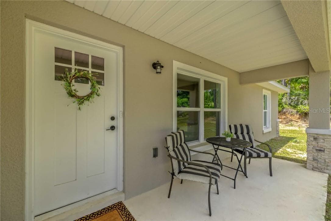 Front Porch - 6962 SE 124th ST, BELLEVIEW FL 34420