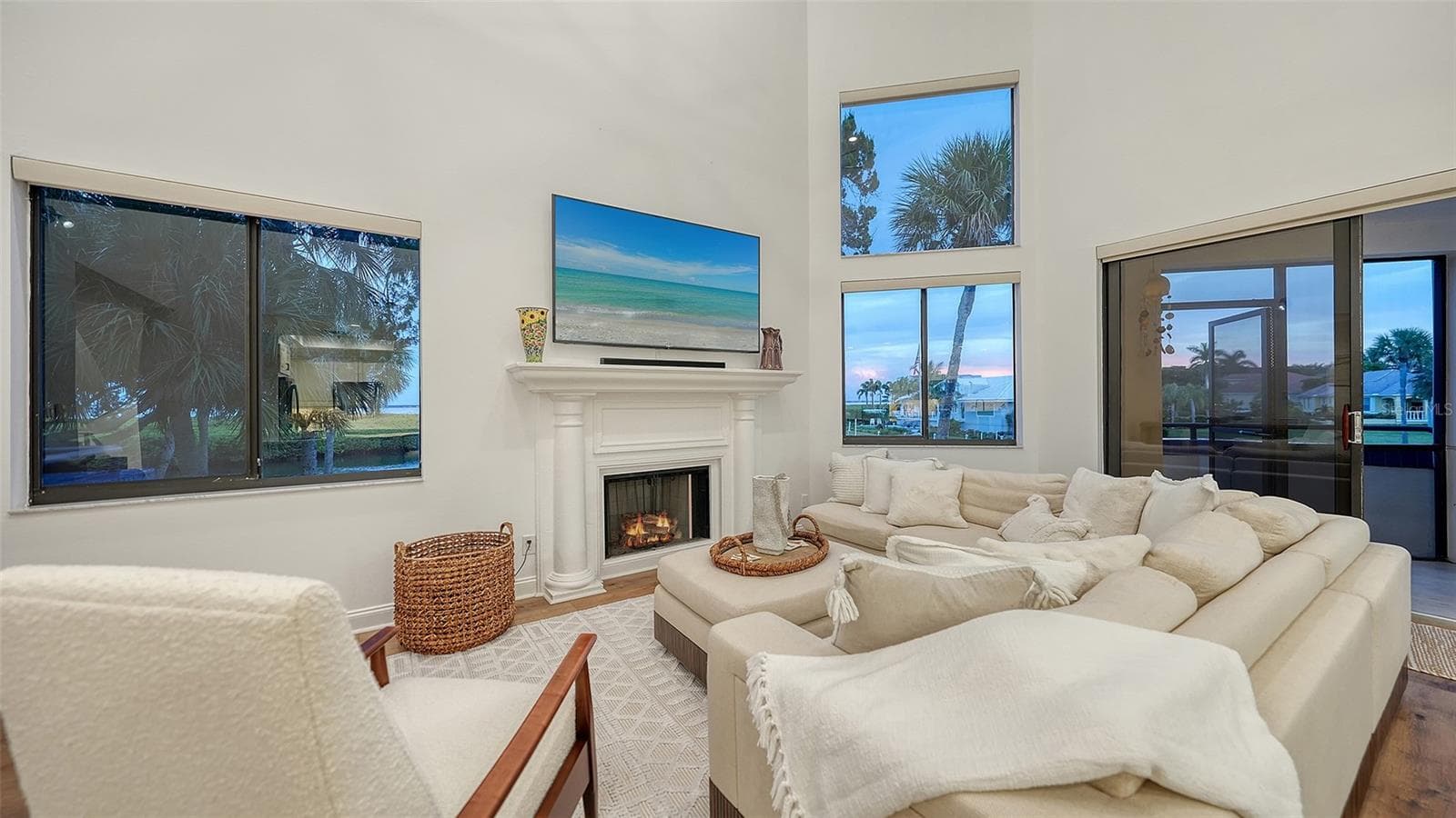 WALLS OF WINDOWS SPILL SOFT LIGHT EVERYWHERE - 1916 HARBOURSIDE DR #804, LONGBOAT KEY