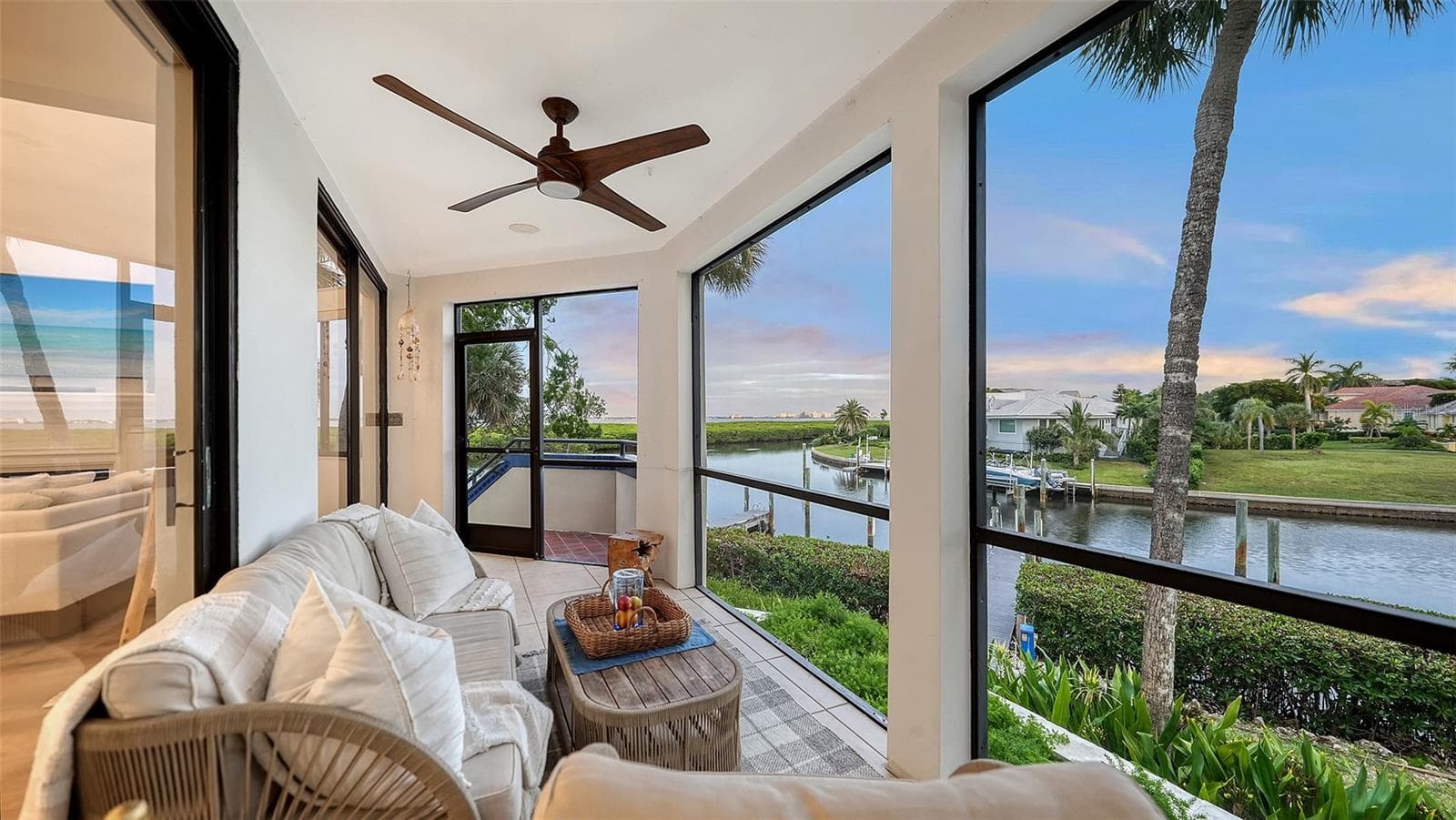 THE SLIDERS CAN OPEN UP THE SPACE FOR FALL BREEZES - 1916 HARBOURSIDE DR #804, LONGBOAT KEY