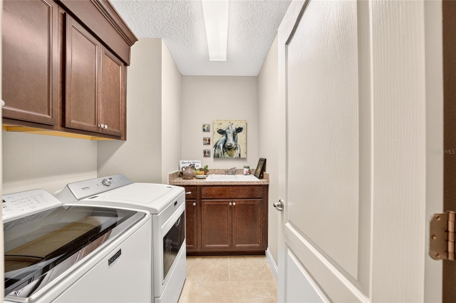 Laundry Room with Wet Sink and Cabinets - 3464 N VONNEGUT PT, BEVERLY HILLS