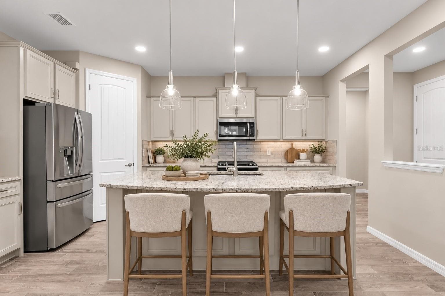Kitchen with center island and gray cabinetry - 2122 LONG SPUR, ODESSA