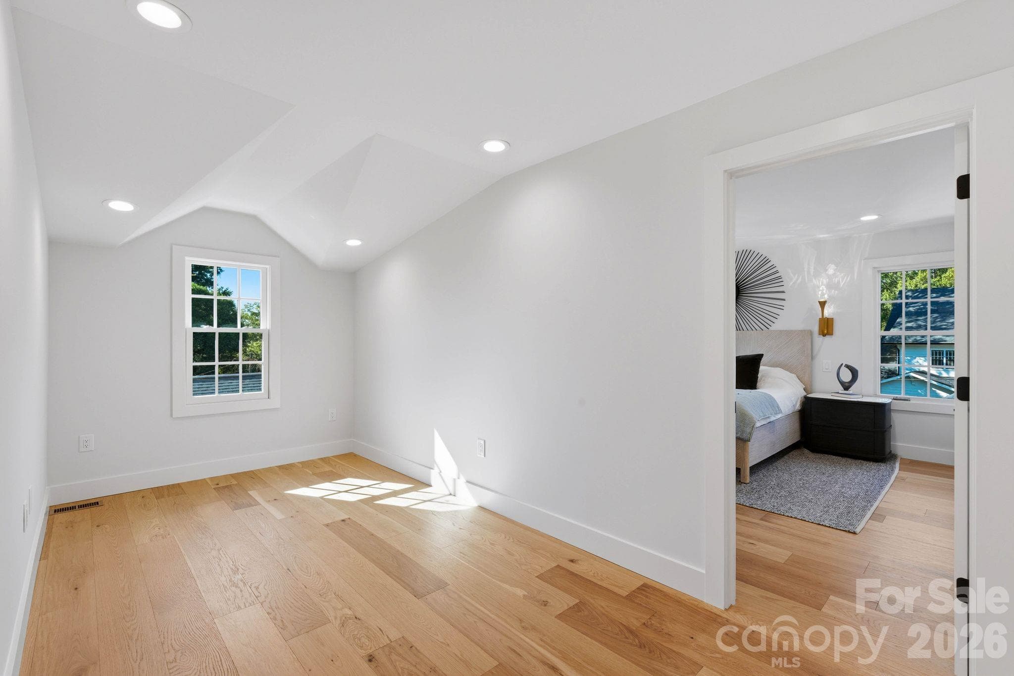 Upper-level open loft area, perfect for a home office, media room or additional living area - 1740 Merriman Avenue, Charlotte