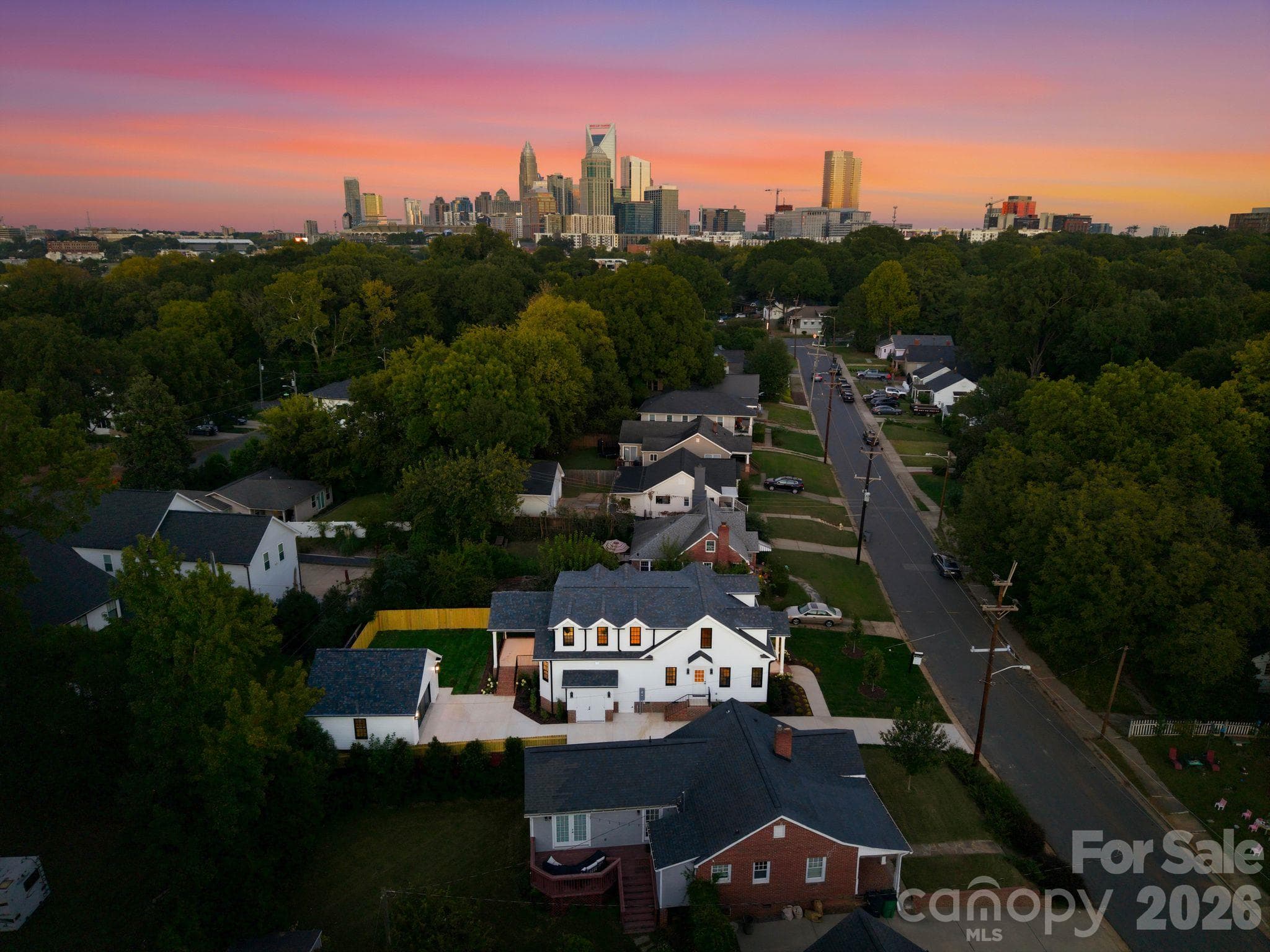 Aerial view at twilight depicting proximity to Uptown - 1740 Merriman Avenue, Charlotte
