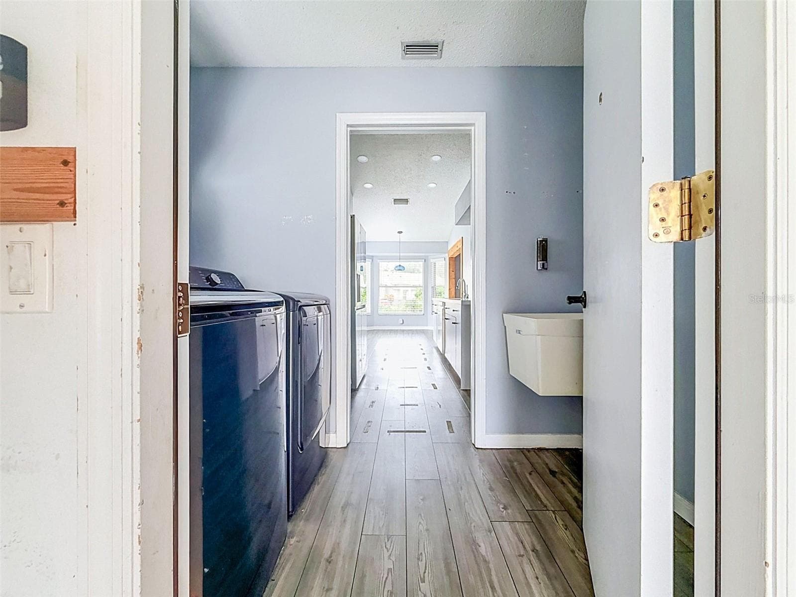 Laundry Room View From Garage - 18709 SUMMERSONG DR, HUDSON