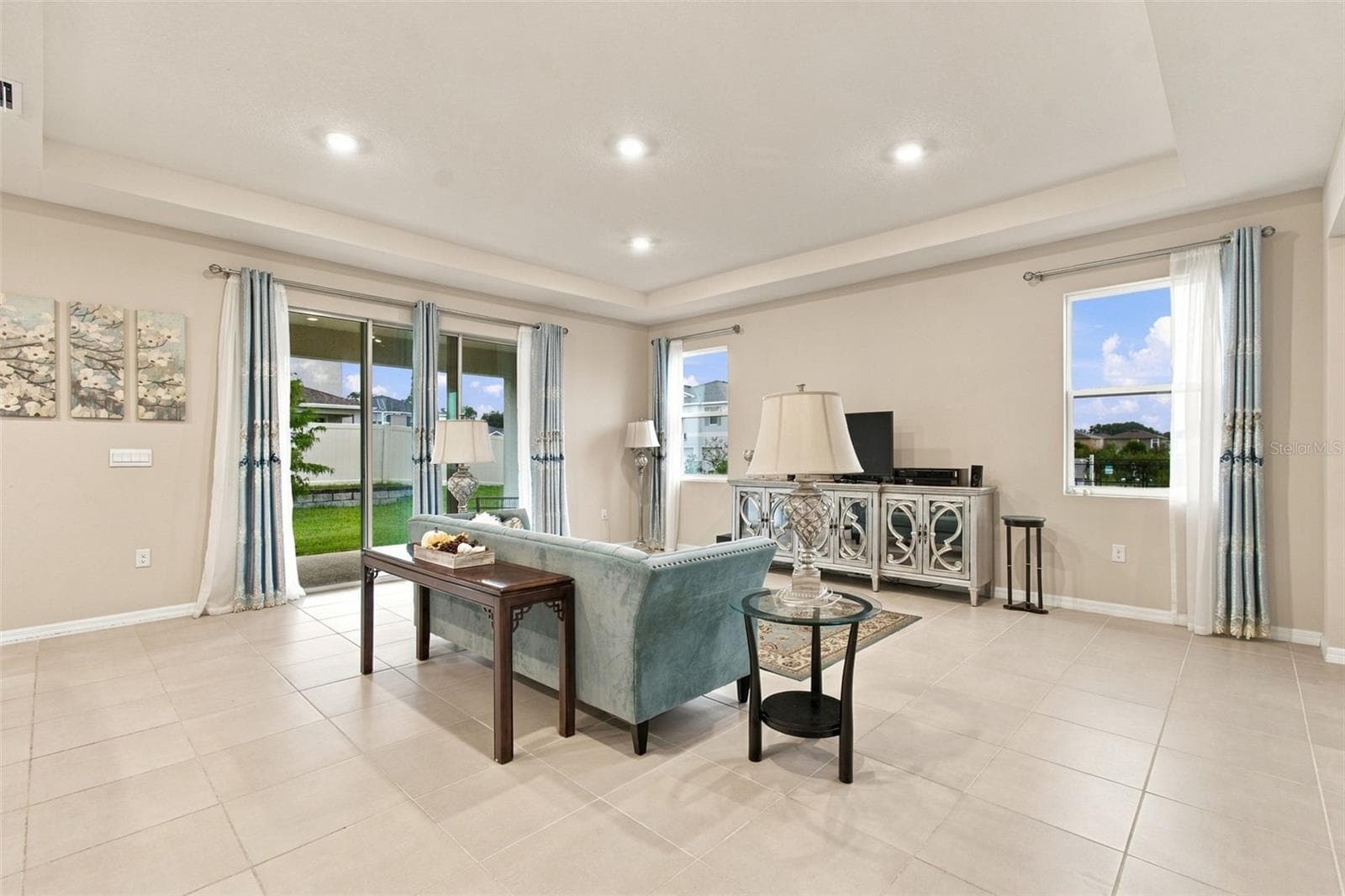 Glass slider exiting to back lanai - 32337 CONCHSHELL SAIL ST, WESLEY CHAPEL