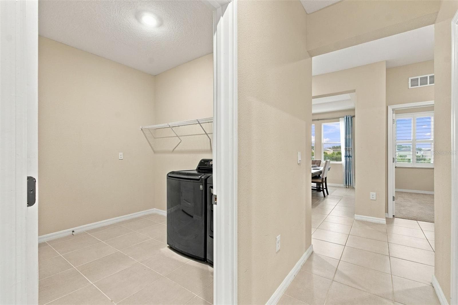 In house laundry room - 32337 CONCHSHELL SAIL ST, WESLEY CHAPEL