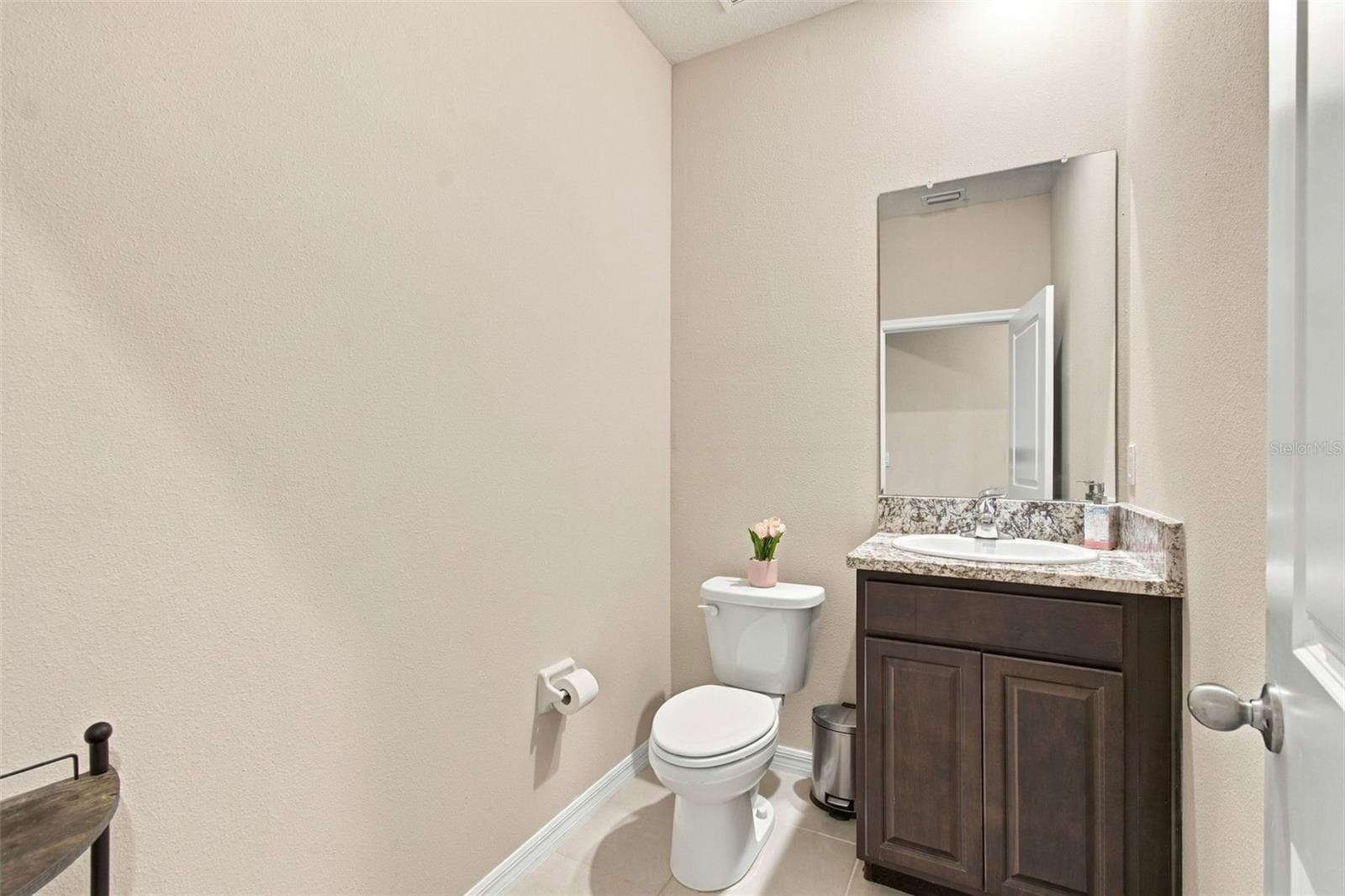 Half bath near garage - 32337 CONCHSHELL SAIL ST, WESLEY CHAPEL