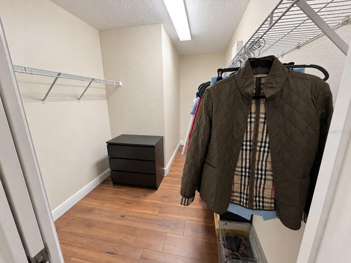 Walk-in closet in the master bedroom - 11117 ANCIENT FUTURES DR, TAMPA