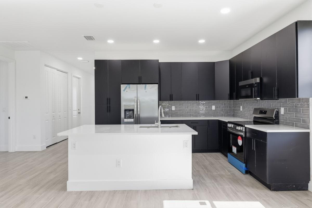 Single Family Residence at 136 LOMAS RD, ROTONDA WEST, photo 7 of 16