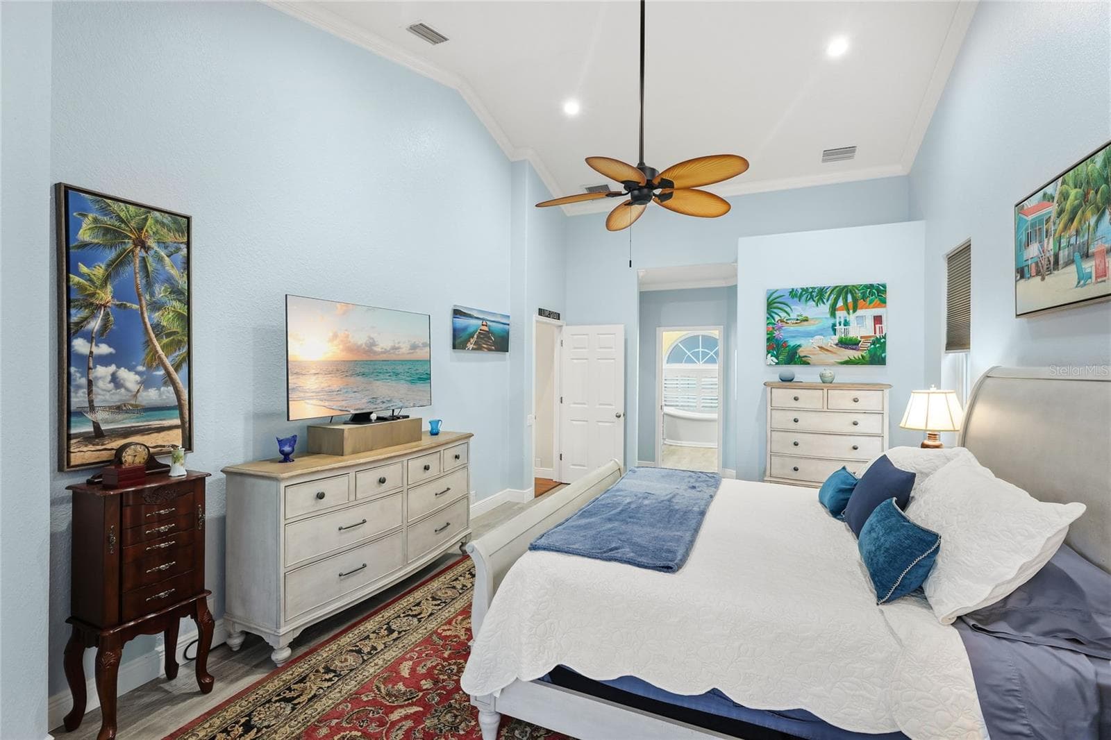 Primary suite with walk-in closet and renovated bathroom features six-inch crown molding throughout. - 3306 LITTLE COUNTRY RD, PARRISH